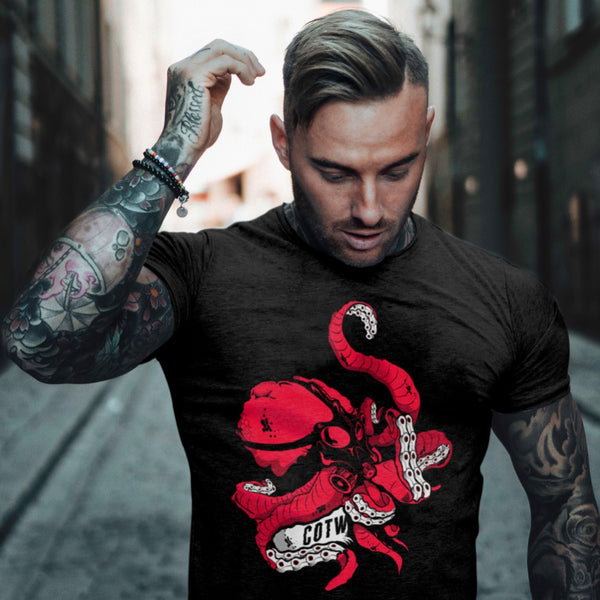 Tattooed male wearing Creature of the Wheel Octopus Chain Tshirt